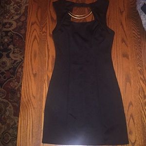Black body-con, cut-out, golden accessory dress